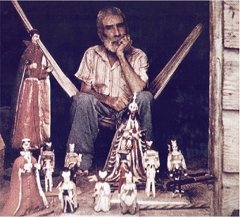 Zoilo Cajigas with Our Lady of Montserrat sculpture