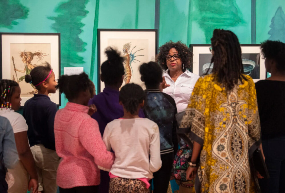 Local students on a tour during a community program