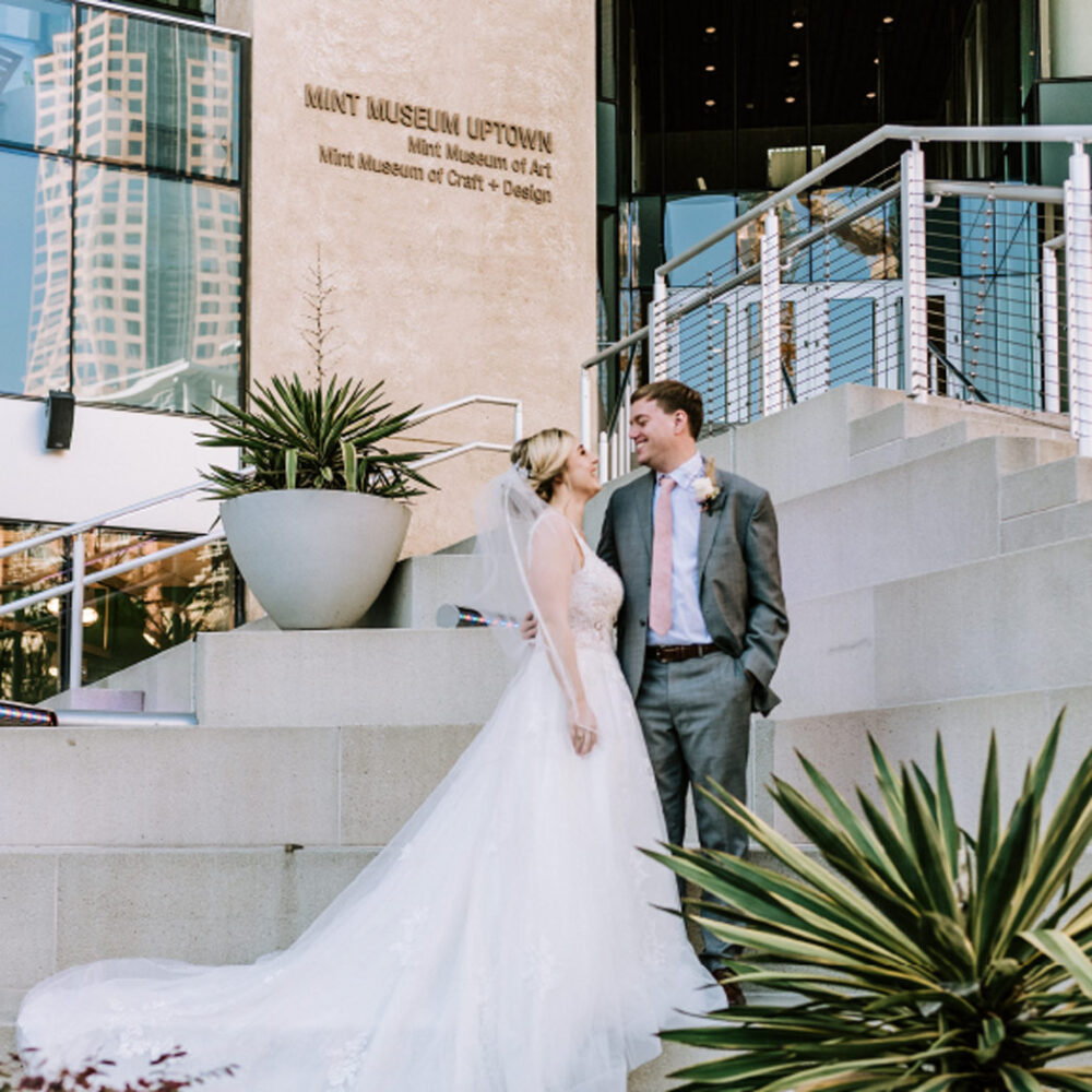 Newlyweds outside Mint Uptown