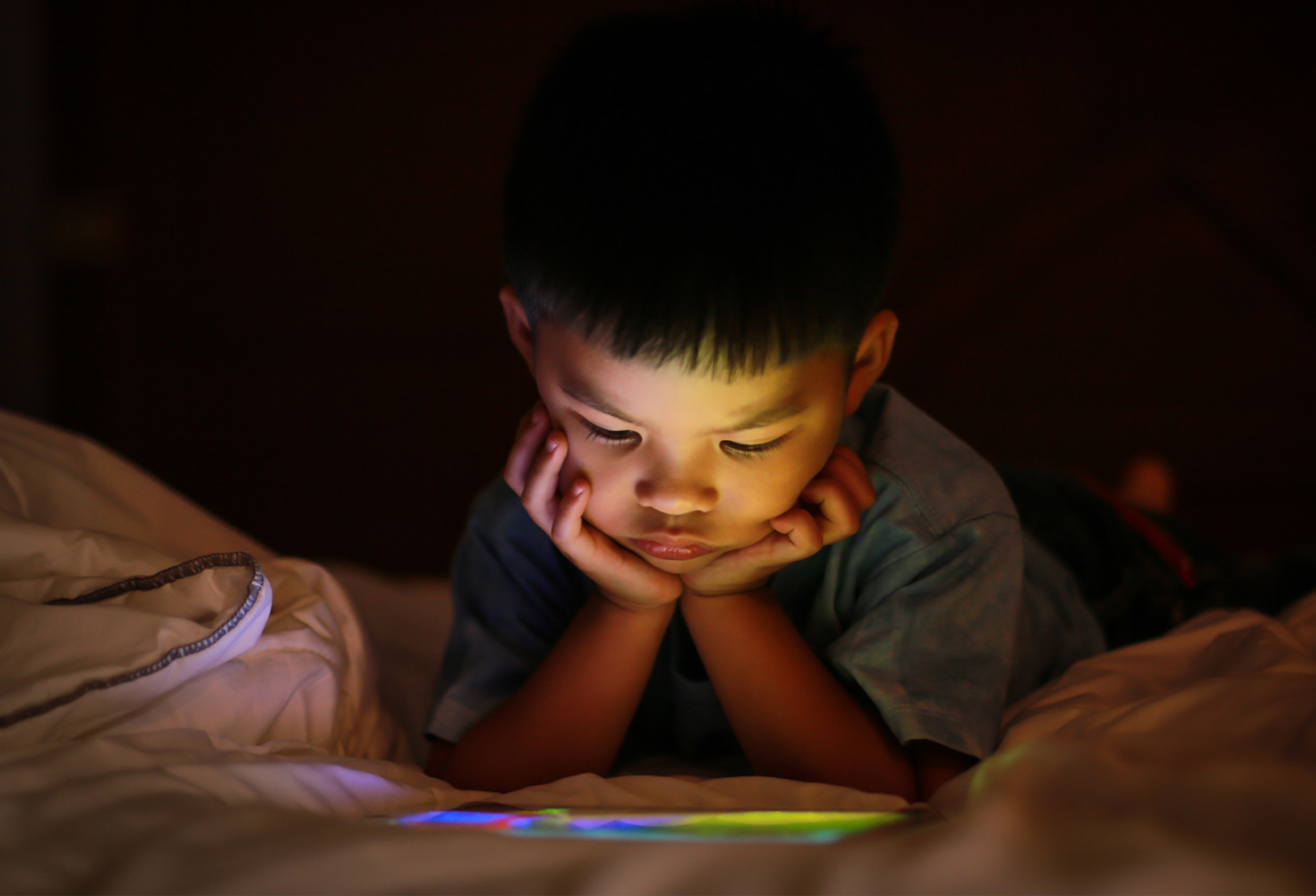 Student learning from tablet at home
