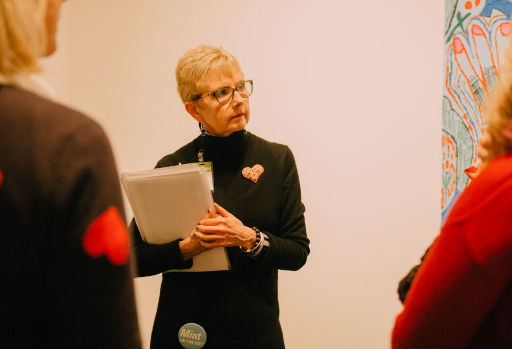 A docent leading a tour at the museum