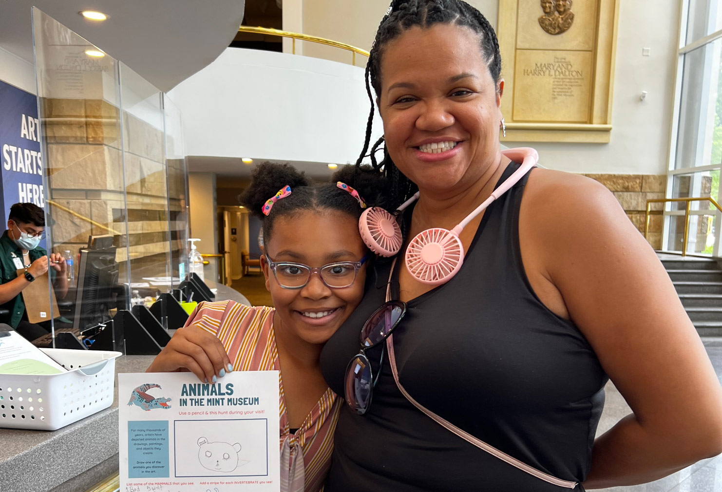 Mother and daughter smiling