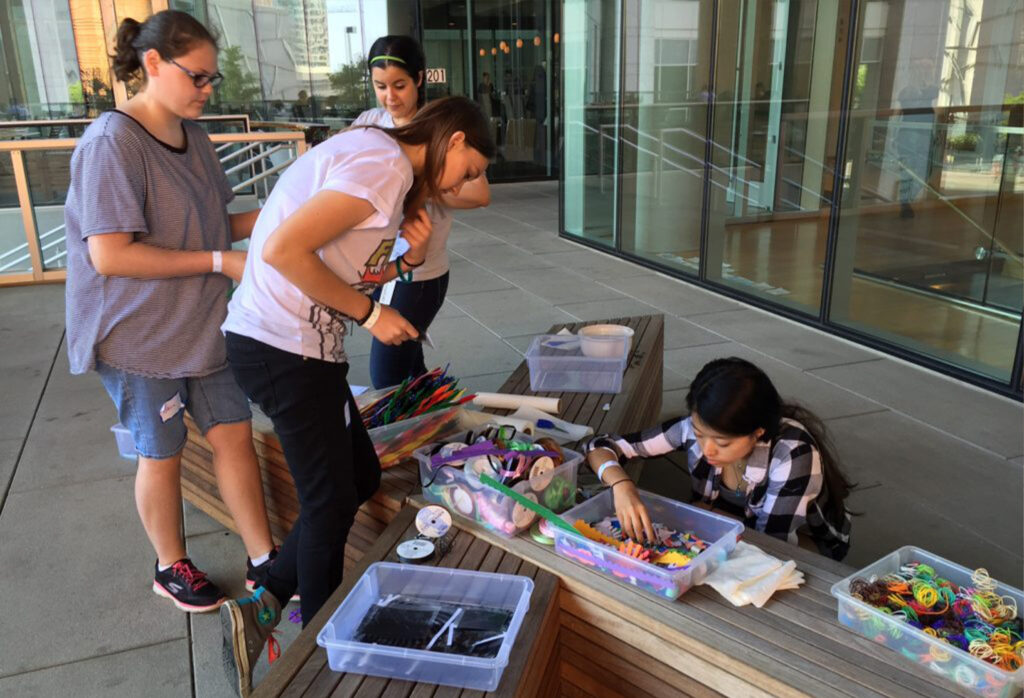 Students experiencing hands-on art at the museum