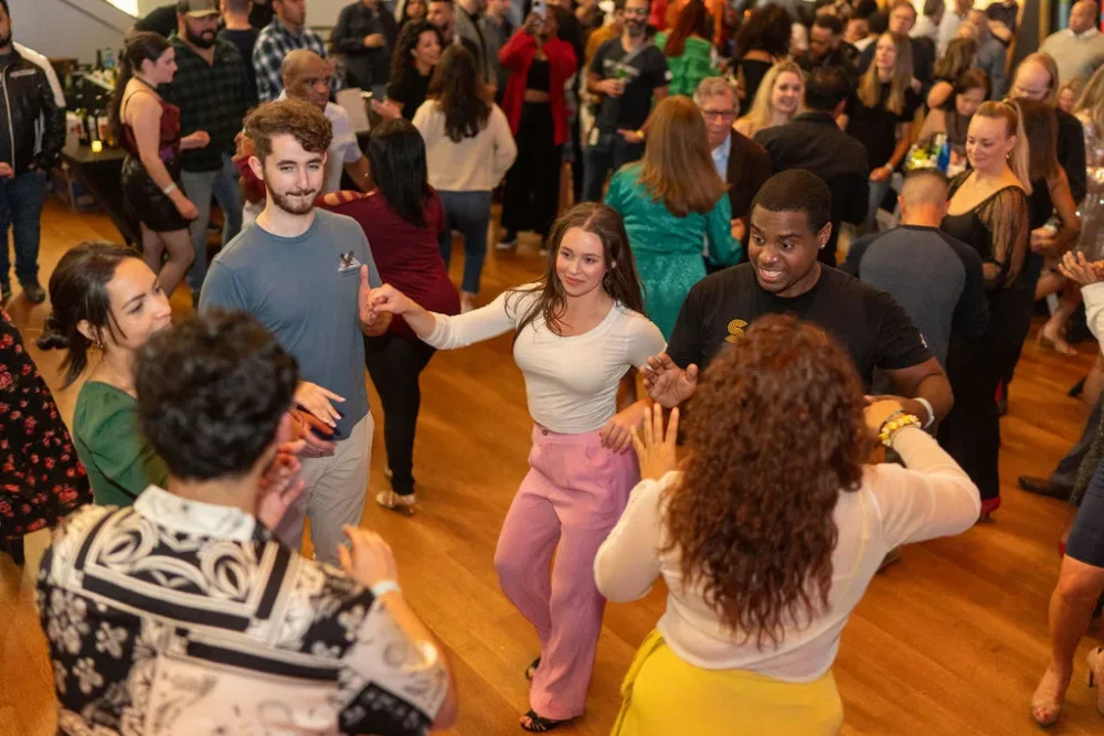 Group of young adults dancing at Mint 2 Move