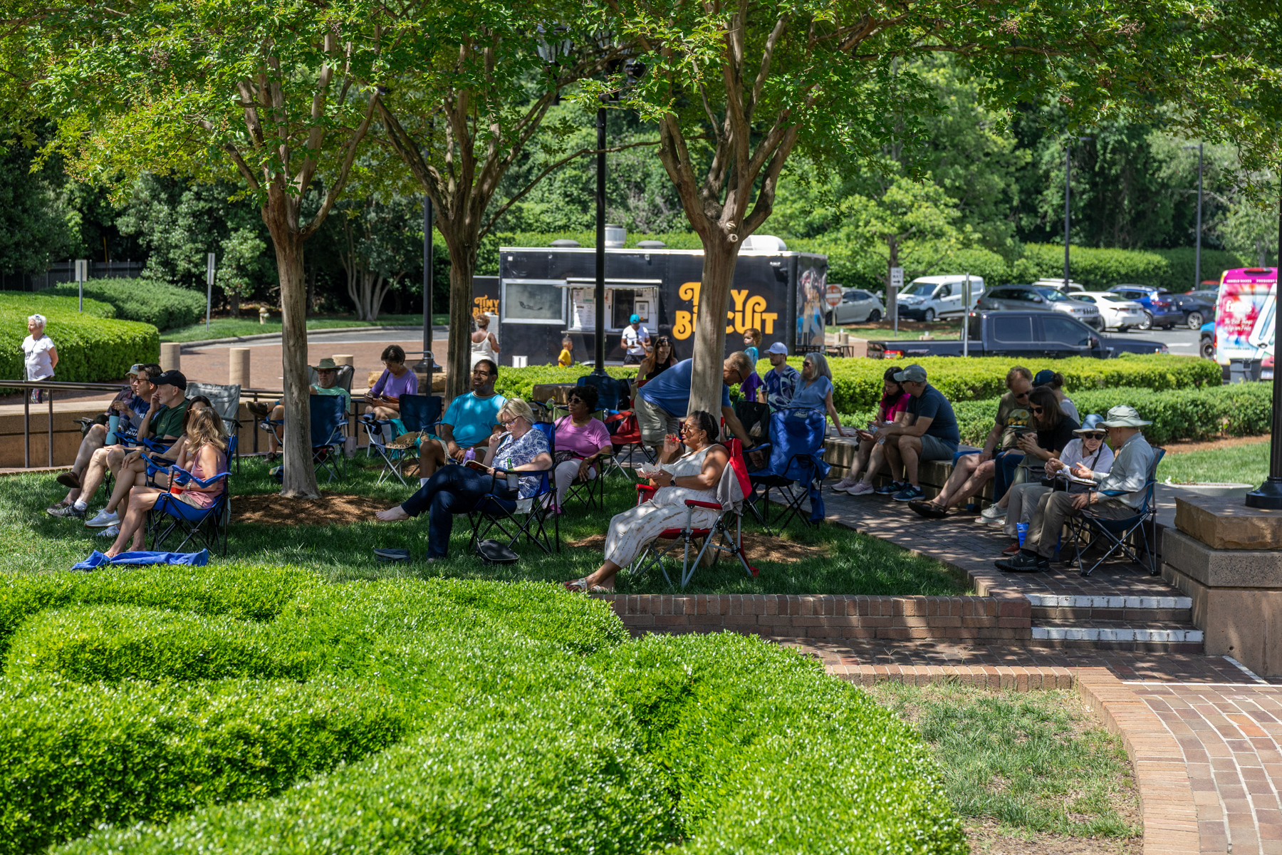 Group of people hanging out during Party in the Park