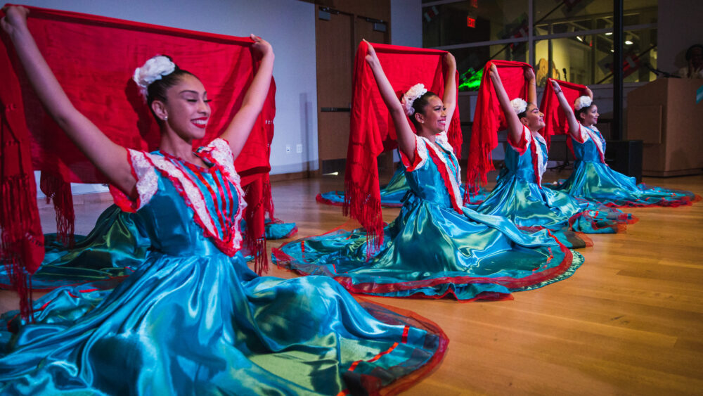 Group of young dancers performing during a Poesia cafe