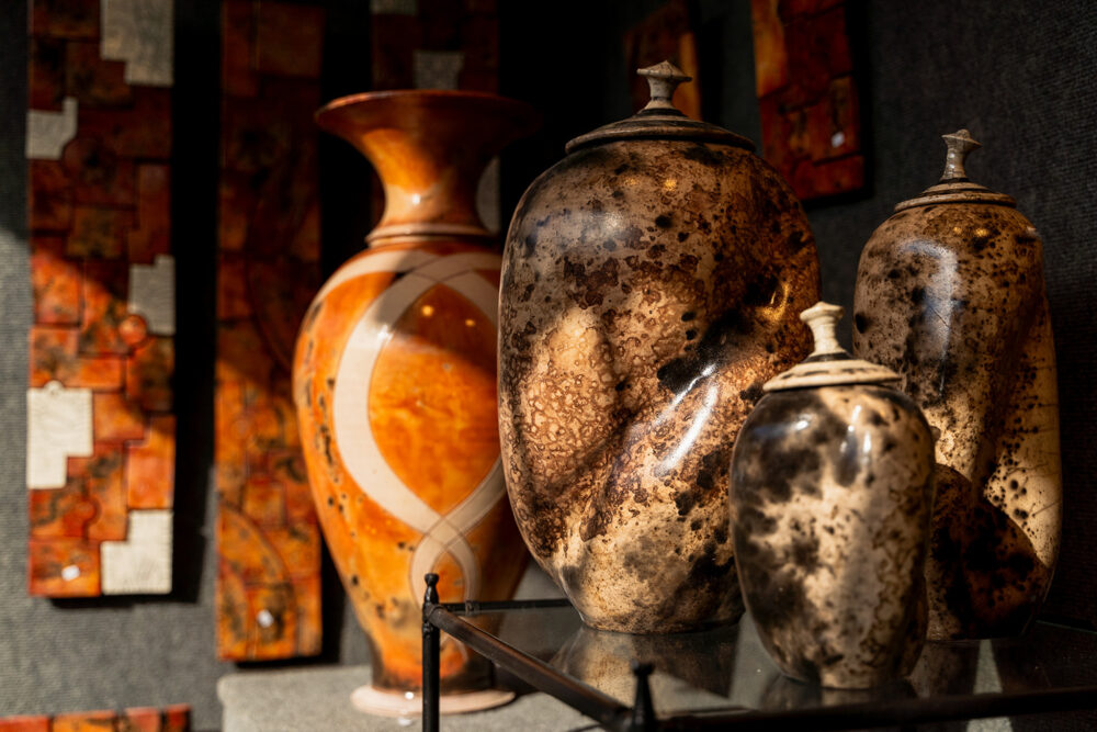 Group of large pottery vessels on display at Potters Market